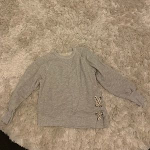 Gray Zara sweatshirt for girls.